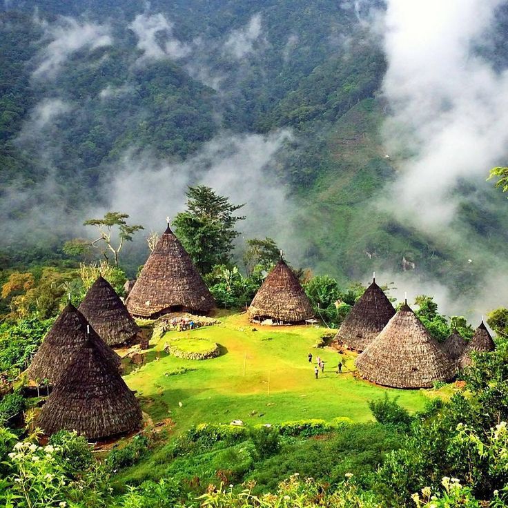 Traditional cone-shaped houses of Wae Rebo village in the mountains